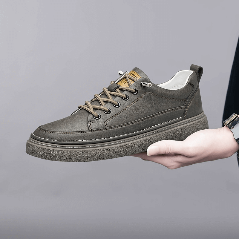 Stylish leather breathable men's sneaker in gray, featuring a lace-up design and a rubber sole for comfort and style - SF1182